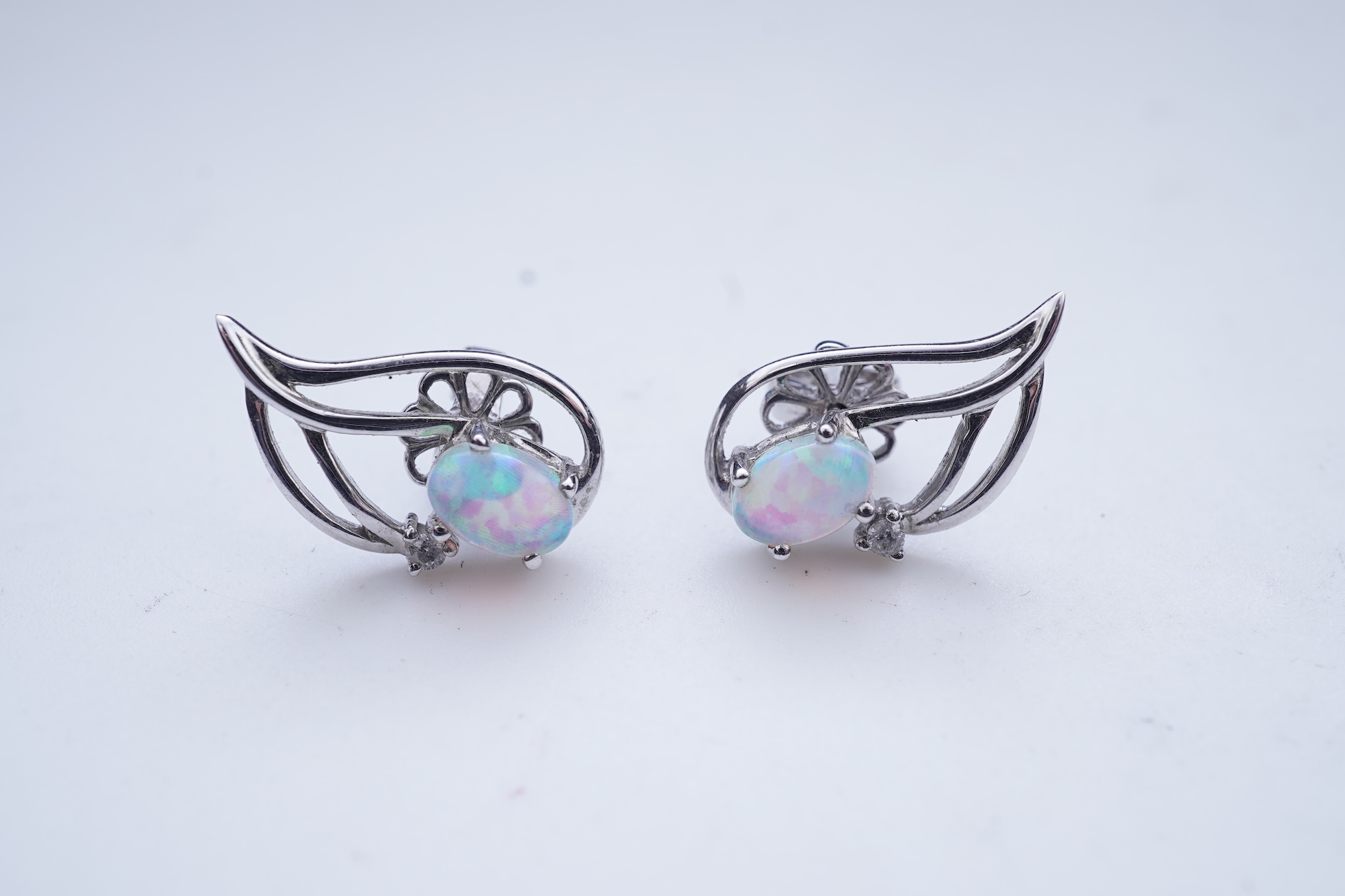 A synthetic opal demi-parure